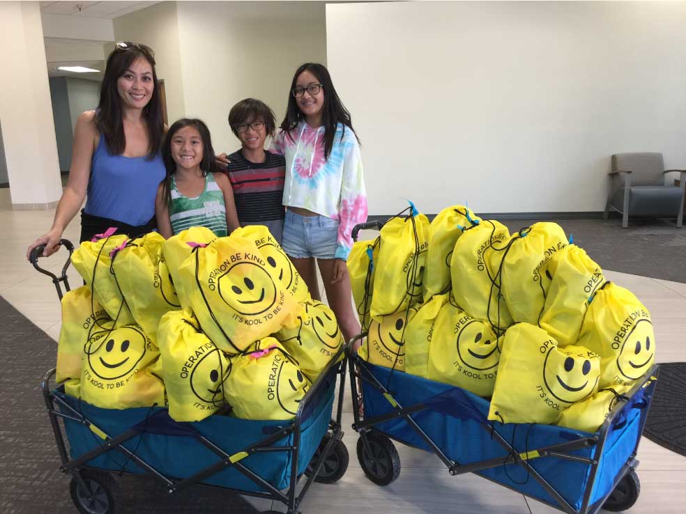 mila-and-the-kids-deliverying-chemo-bags-to-compassionate-care